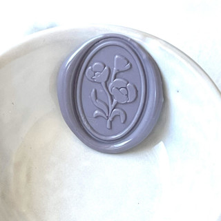 This is a multicolorassorted-colors wax seals by Abby Choi called oval flower wax seal  pack of 10, customizable in standard