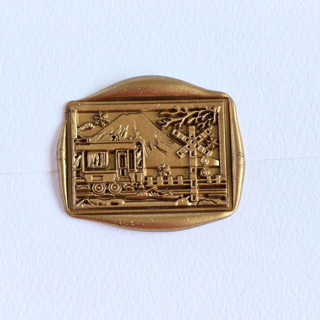 This is a multicolor wax seals by Inkspiringletters called mount fuji- customizable color- set of 25 hand-crafted wax seals in standard