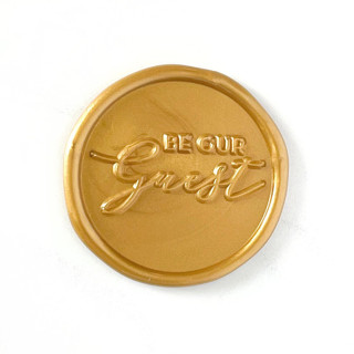 This is a gold wax seals by Abby Choi called be our guest wax seal in traditional gold pack of 10 in standard