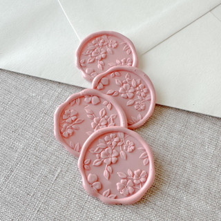 This is a pink wax seals by Maria Ferrer G. called dusty rose floral pattern 3d wax seal stickers | set of 10 in standard