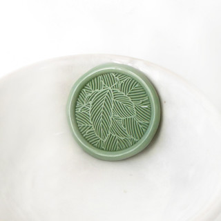 This is a multicolorassorted-colors wax seals by Abby Choi called leaves wax seals pack of 10, customizable color in standard