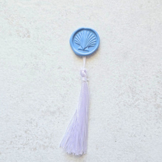 This is a multicolor wax seals by Inkspiringletters called modern seashell wax seal with white tassel- customizable colors- set of 25 hand-crafted wax seals in standard