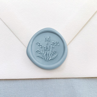 This is a blue wax seals by Sterling Stripes called lily wax seal (50 pack) personalized in standard