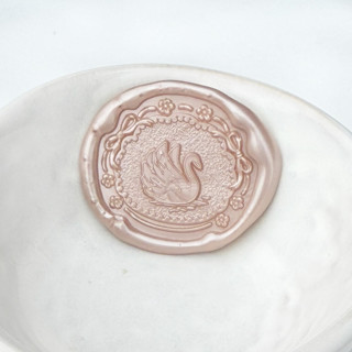 This is a multicolorassorted-colors wax seals by Abby Choi called swan wax seal, pack of 10, customizable color in standard