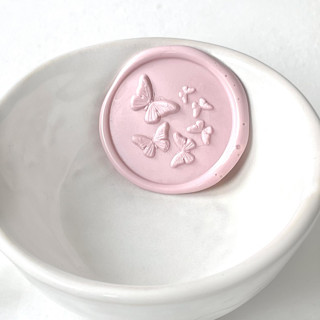 This is a multicolorassorted-colors wax seals by Abby Choi called butterflies wax seal, pack of 10, customizable color in standard