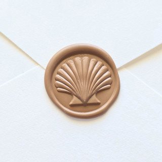 This is a brown wax seals by Inkspiringletters called modern seashell- mocha -  hand-crafted wax seals- set of 25 in standard