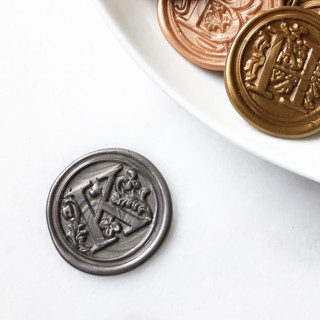 This is a multicolorassorted-colors wax seals by Abby Choi called decorative initials wax seal, pack of 10, customizable color in standard