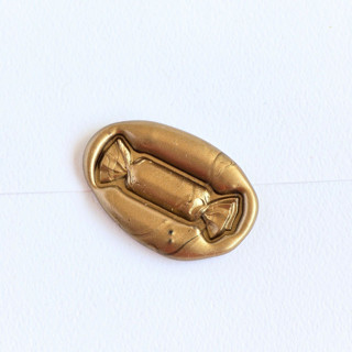 This is a multicolor wax seals by Inkspiringletters called candy- customizable color- set of 25 hand-crafted wax seals in standard