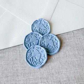 This is a blue wax seals by Maria Ferrer G. called dusty blue celebration wax seal stickers - champagne toast | set of 10 in standard