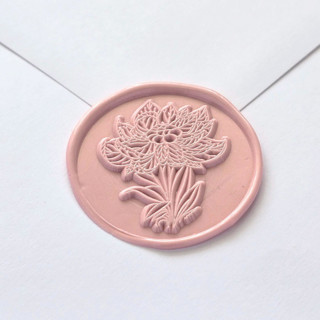 This is a multicolor wax seals by Inkspiringletters called poinsettia flower- customizable color- set of 25 hand-crafted wax seals in standard