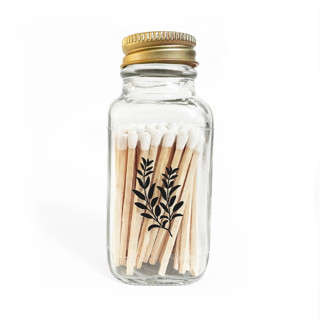 This is a gold journals by Jessica Cunningham called sage 2" white match jar in standard