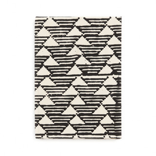 This is a black journals by Anjali Purohit called tria black white zero waste handmade artisanal journal in standard