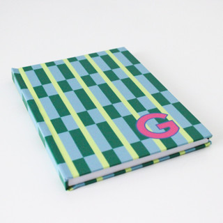 This is a green journals by Clairebella called custom maxi green single initial journal in standard