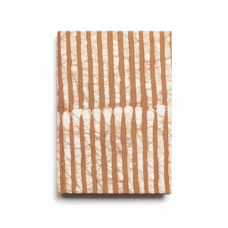 This is a brown journals by Anjali Purohit called oak , a zero waste handmade artisanal journal in standard