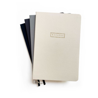 This is a beige journals by Jessica Cunningham called linen recipe book | gold foil on cream linen in standard