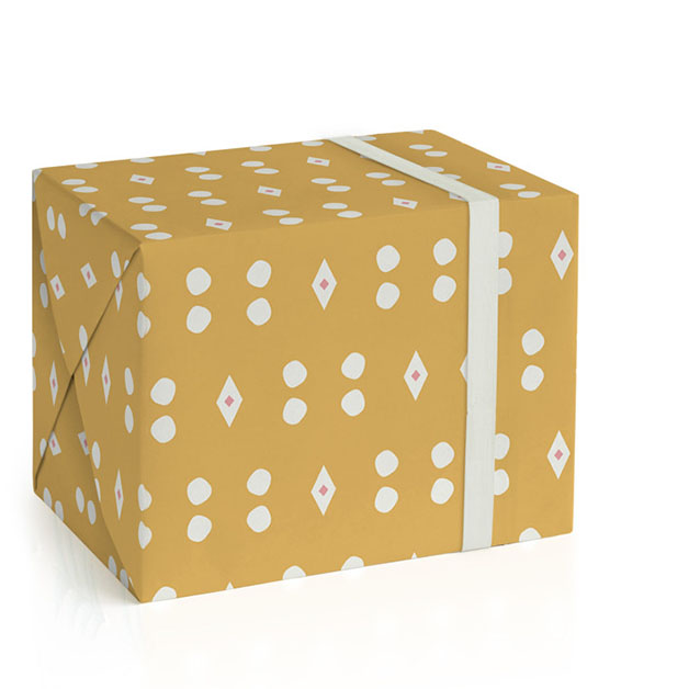 This is a gold wrapping paper by Carrie ONeal called embark in standard