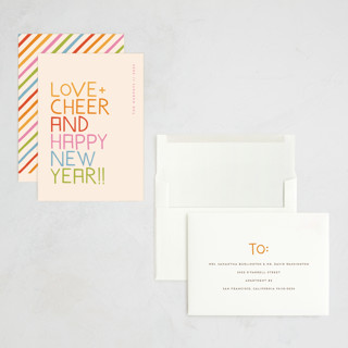 This is a rainbow holiday photo cards with standard by Snow and Ivy called love and cheer printing on signature in grand