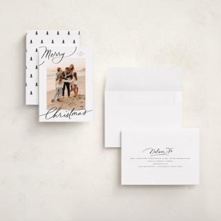 This is a snow holiday photo cards with standard by Everett Paper Goods called evoke printing on signature in grand