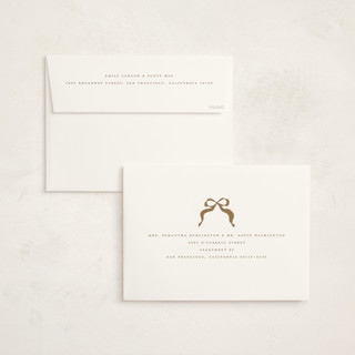 This is a champagne holiday photo cards with standard by Gwen Bedat called eiffel printing on signature in grand