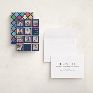 This is a peacock holiday photo cards with standard by lulu and isabelle called a year of colors printing on recycled smooth signature in grand