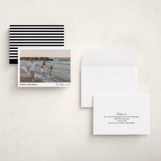 This is a tuxedo holiday photo cards with standard by Annie Shapiro called primrose printing on recycled smooth signature in grand