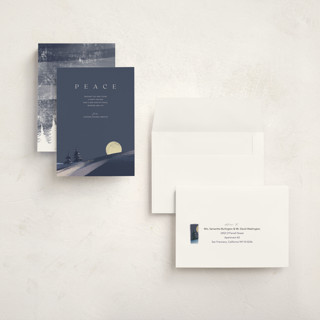 This is a navy holiday photo cards with standard by Eric Ransom called serene peace printing on signature in grand