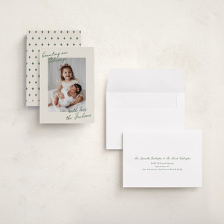 This is a pine needle holiday photo cards with standard by Deynaaz Daraei called luant printing on signature in grand