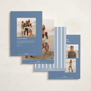 This is a powder blue holiday photo cards with standard by Erin L. Wilson called seabreeze printing on recycled smooth signature in grand