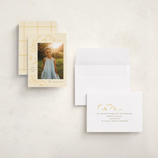 This is a butter holiday photo cards with standard by Griffinbell Paper Co. called sketched florals printing on signature in grand
