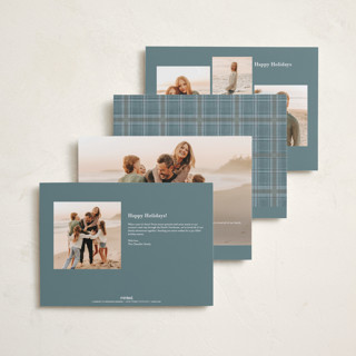 This is a powder blue holiday photo cards with standard by Baumbirdy called traditional plaid printing on signature in grand