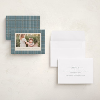 This is a powder blue holiday photo cards with standard by Baumbirdy called traditional plaid printing on signature in grand