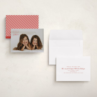 This is a cranberry holiday photo cards with standard by Heather Schertzer called believe printing on signature in grand
