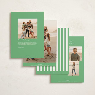 This is a greenery holiday photo cards with standard by mo kelley called wreath with bow printing on signature in grand