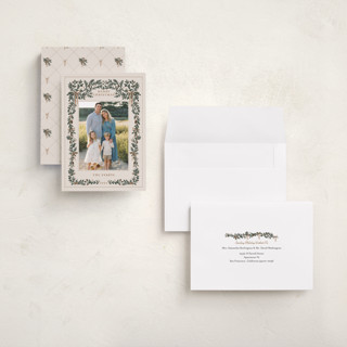 This is a champagne holiday photo cards with standard by Angel Walker called merriest botanicals printing on recycled smooth signature in grand