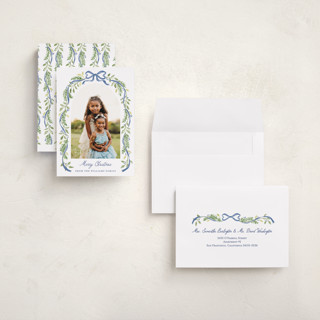 This is a moonlight holiday photo cards with standard by Sarah Knight called ribbon arch printing on recycled smooth signature in grand