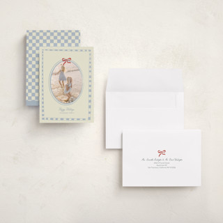 This is a celestial holiday photo cards with standard by Helena Vitto called little bow printing on recycled smooth signature in grand