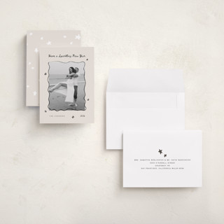 This is a ink holiday photo cards with standard by Poised Avenue called new year doodles printing on recycled smooth signature in grand