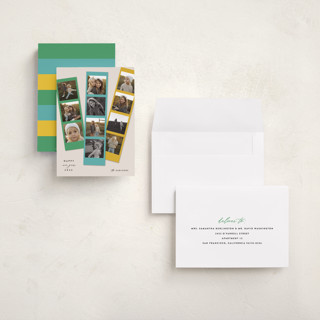 This is a green apple holiday photo cards with standard by Maria Alou called candy snaps printing on signature in grand