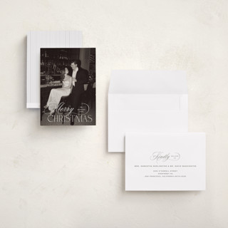 This is a snow holiday photo cards with standard by Design Lotus called holiday in type printing on signature in grand