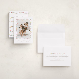 This is a frosting holiday photo cards with standard by Holly Whitcomb called crazy lights printing on recycled smooth signature in grand