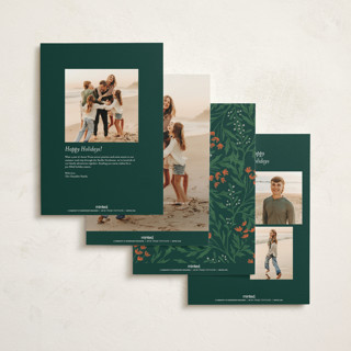 This is a pine holiday photo cards with standard by Amy Kross called festive blooms printing on signature in grand