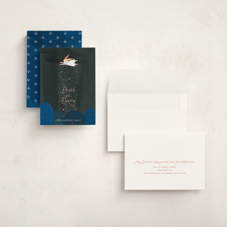 This is a forest holiday photo cards with standard by Eve Schultz called snow angel printing on signature in grand