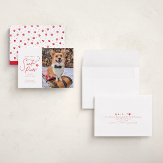 This is a cherry holiday photo cards with standard by Everett Paper Goods called here comes santa paws printing on recycled smooth signature in grand