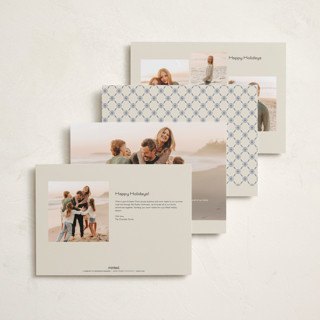 This is a porcelain holiday photo cards with standard by Sabrin Deirani called peaceful blooms in blue printing on recycled smooth signature in grand