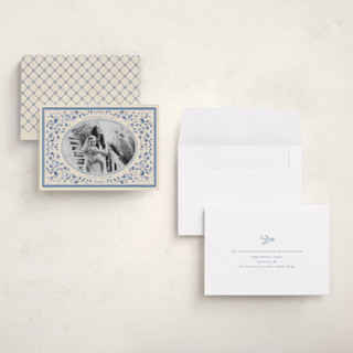 This is a porcelain holiday photo cards with standard by Sabrin Deirani called peaceful blooms in blue printing on recycled smooth signature in grand