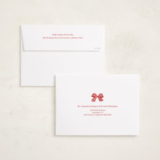 This is a poinsettia holiday photo cards with standard by Angela Marzuki called ribbon wrapped printing on signature in grand