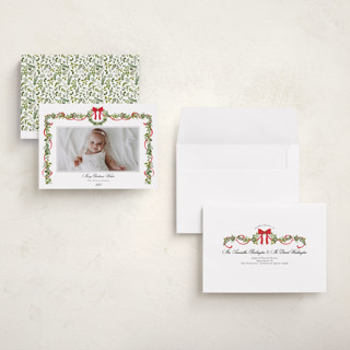 This is a candy cane holiday photo cards with standard by Susan Moyal called bows & ribbon printing on signature in grand