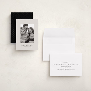 This is a newsprint holiday photo cards with standard by Lea Delaveris called above all printing on signature in grand