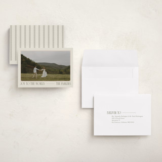 This is a cream holiday photo cards with standard by Robert and Stella called vintage postcard printing on signature in grand
