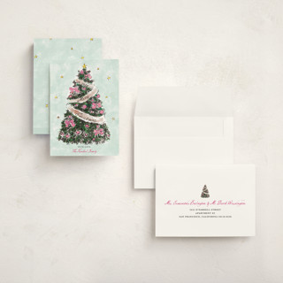 This is a winter rose holiday photo cards with standard by Cass Loh called evergreen magic printing on signature in grand